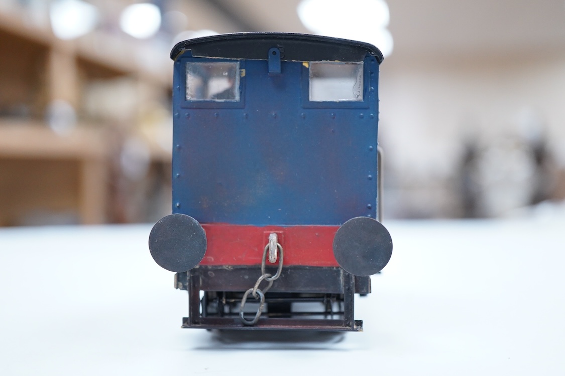 A narrow gauge scratch built model railway locomotive running on 32mm track by John Worsley, a Ruston 0-4-0 diesel shunter, 7, a detailed model with sprung buffers, etc. and fitted with a Mashima 12v dc motor, for two ra